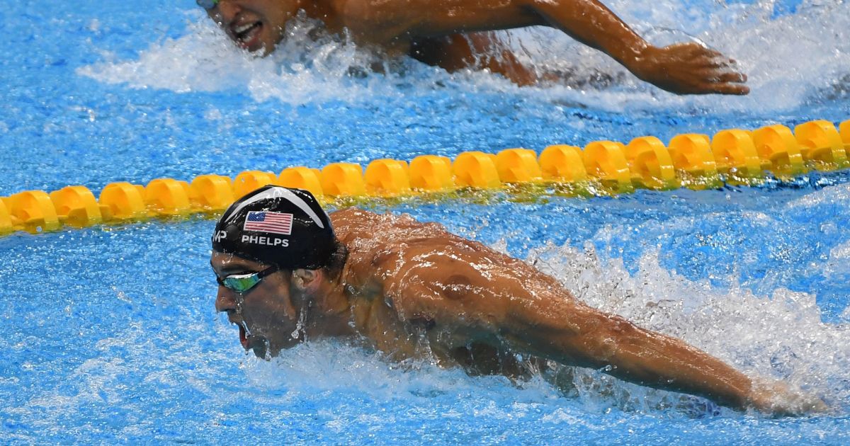 Michael Phelps Wins Gold Medals 20 and 21