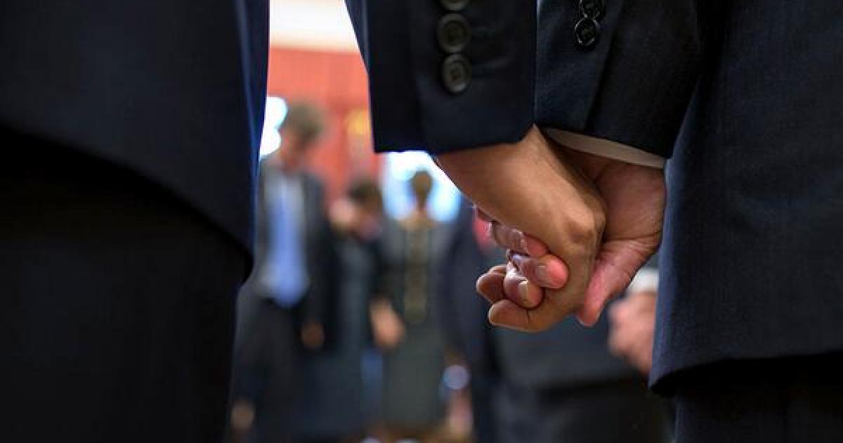 Obama, Biden Hold Hands in Immigration Prayer