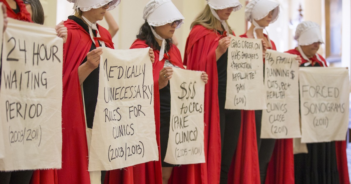 Why Are Women Dressing Up Like Offred From The Handmaid's Tale?